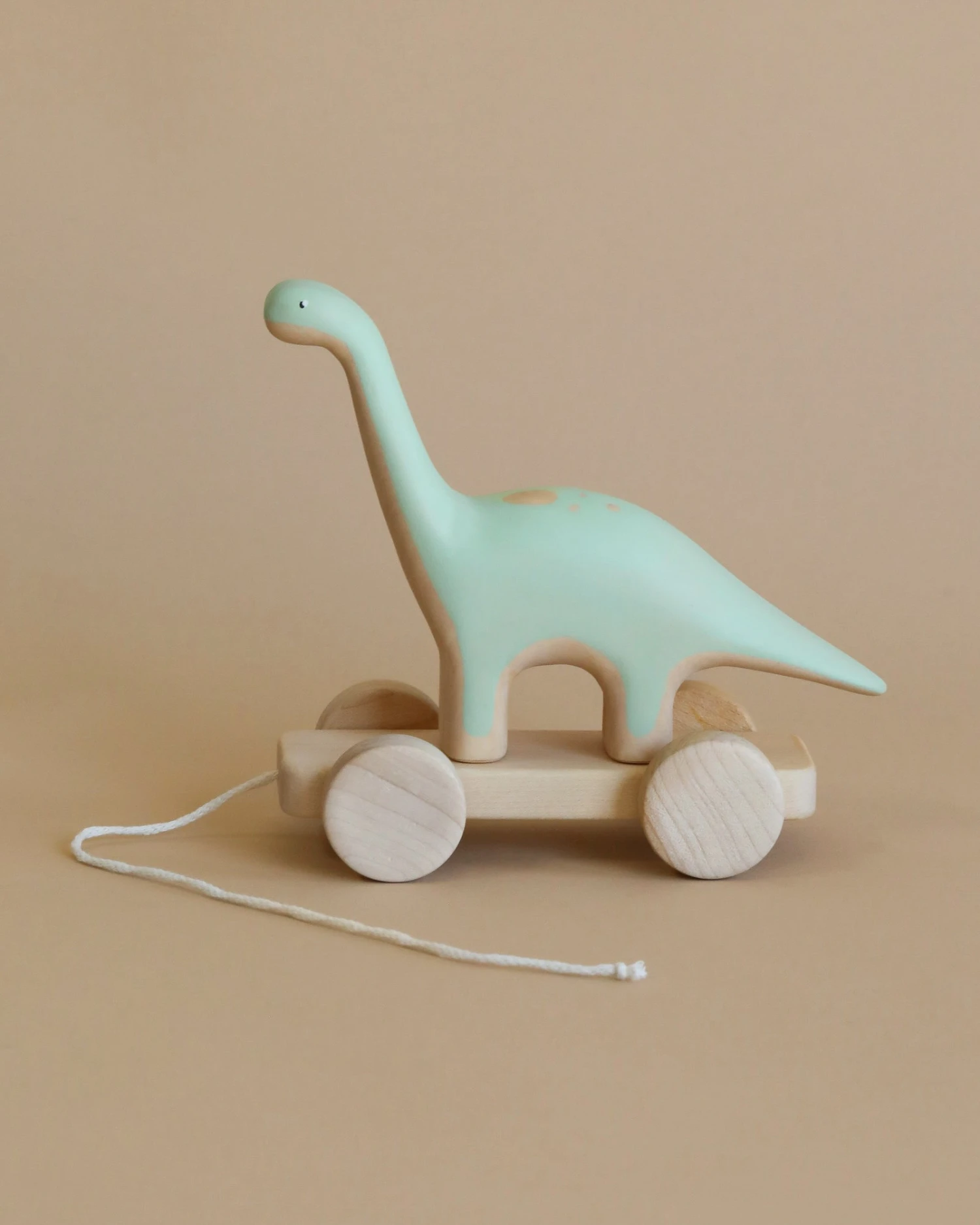Handmade Wooden Brachiosaurus Dinosaur Push Toy With Built-In Magnets - Image 2